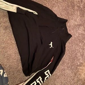 Black zip up quarter neck